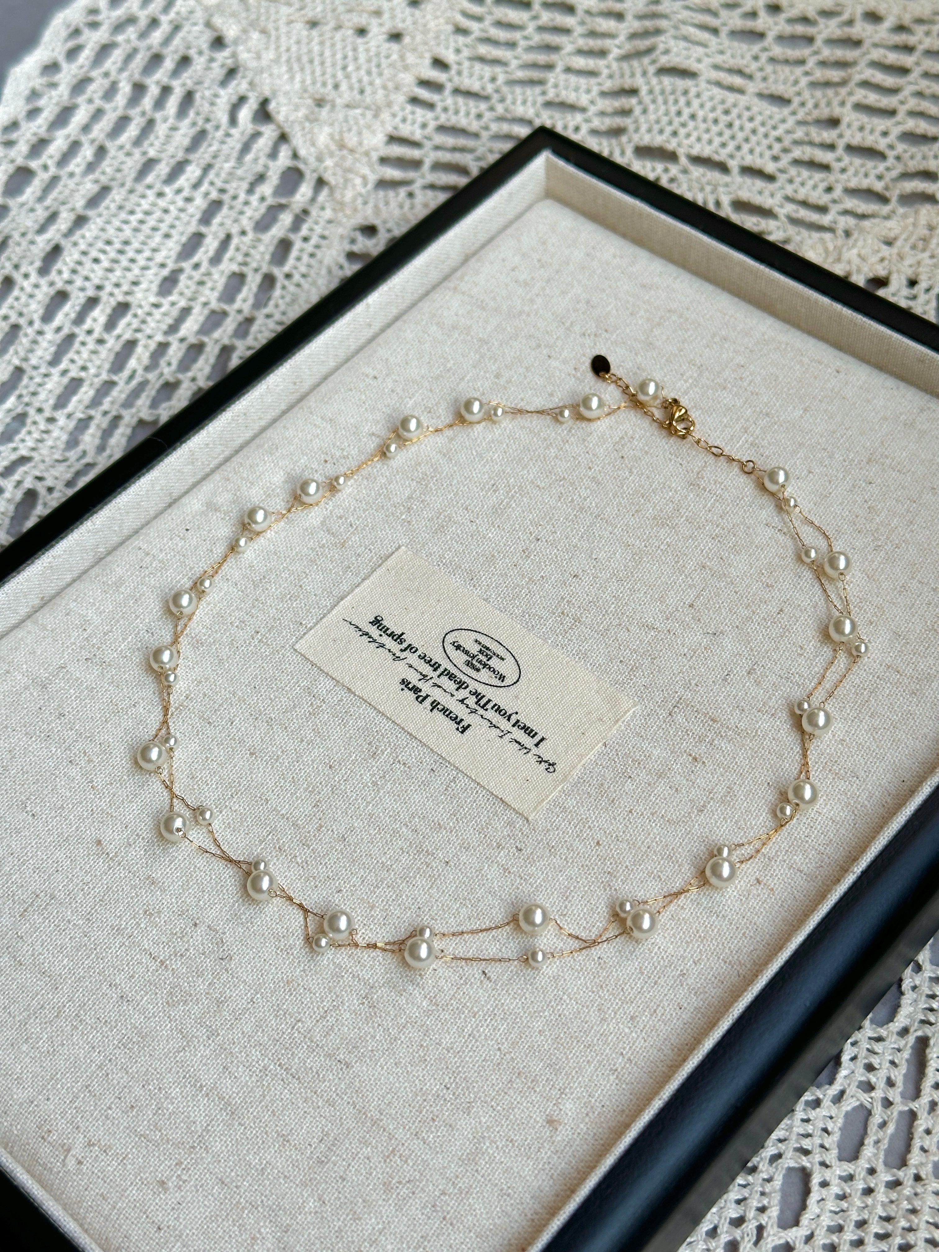 Starry Pearls minimalist pearl necklace with star charms, adjustable, nickel safe