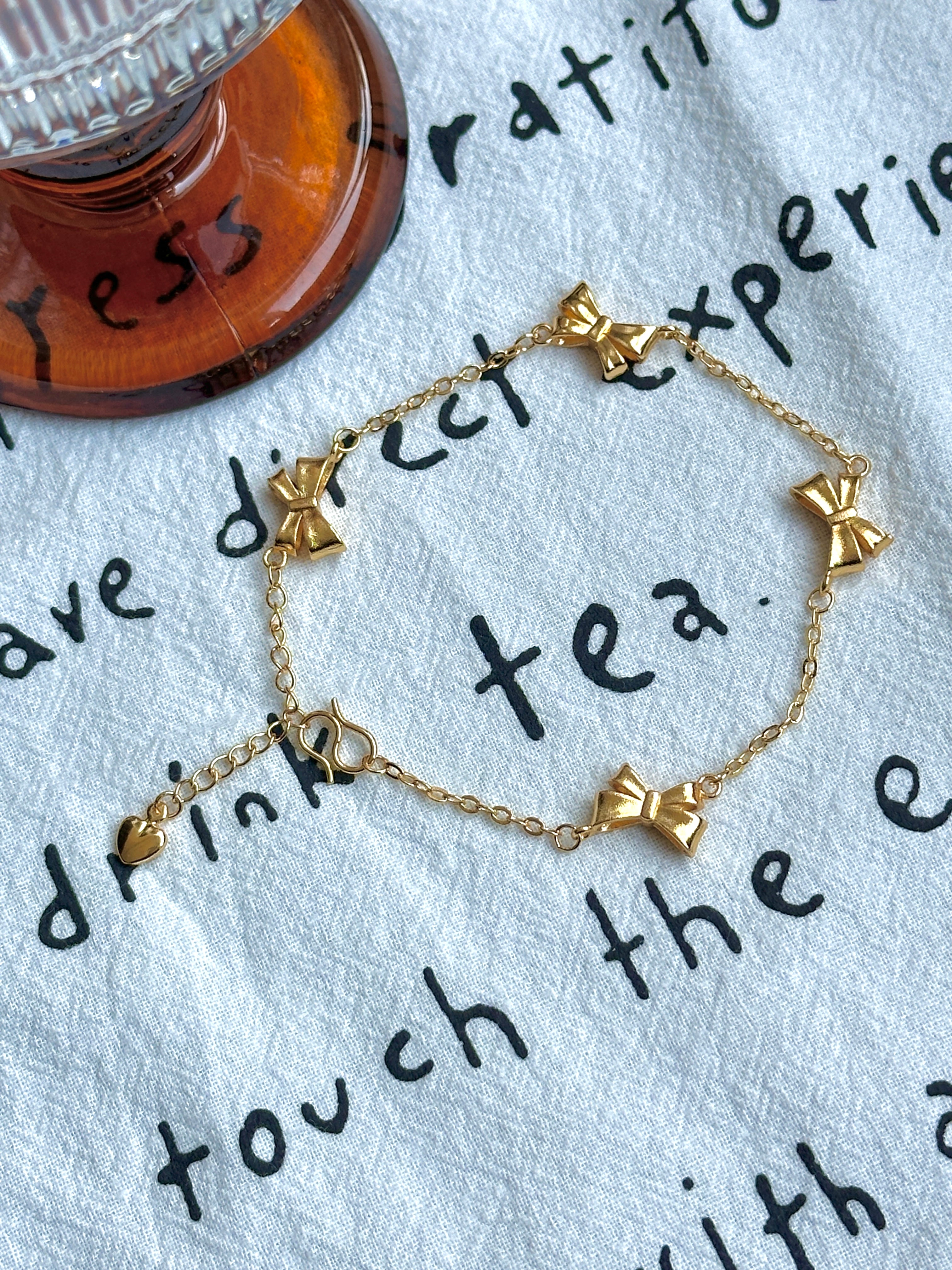 Golden Bow minimalist bow bracelet, daily wear with jeans or dresses, adjustable