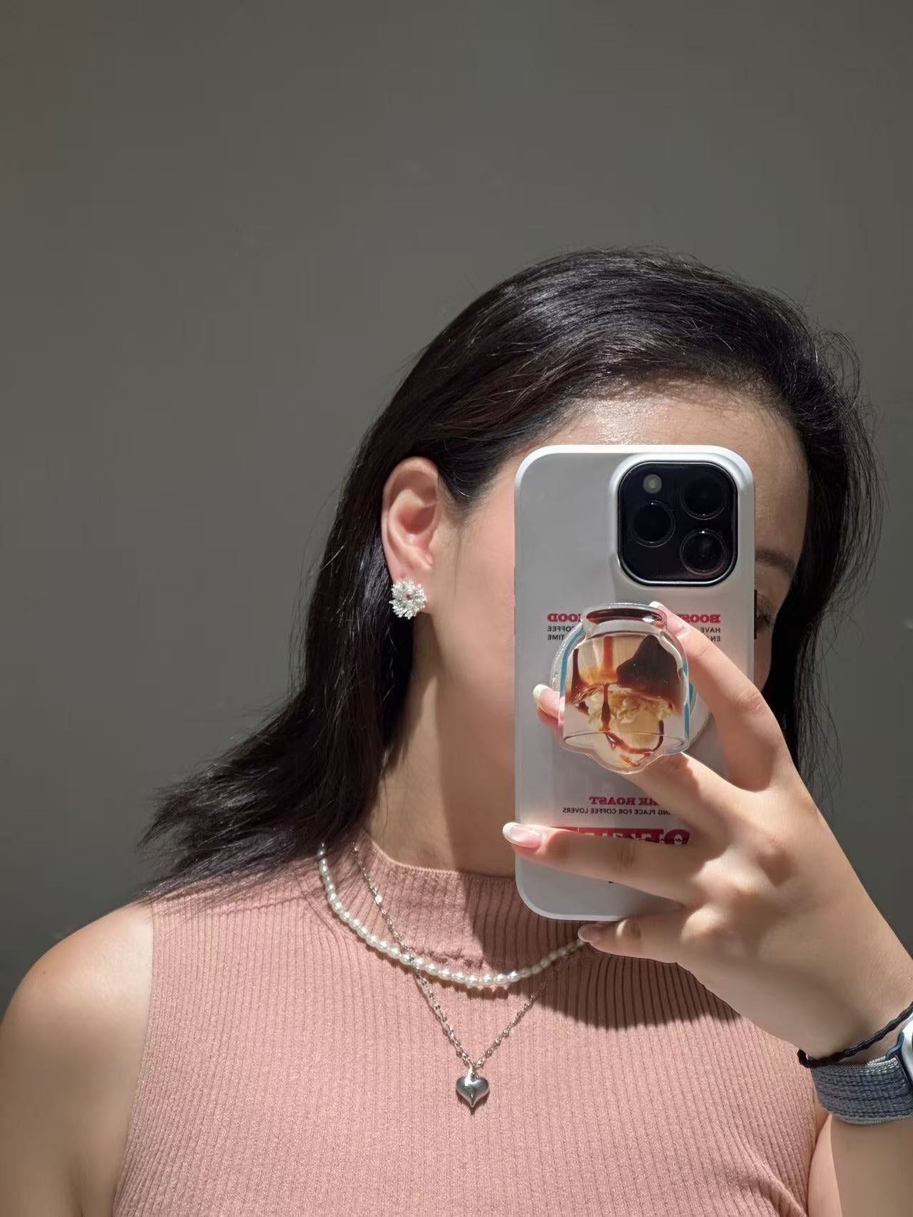 On-ear shot: silver firework earrings, stainless steel, nickel-safe with the necklace Rebellia