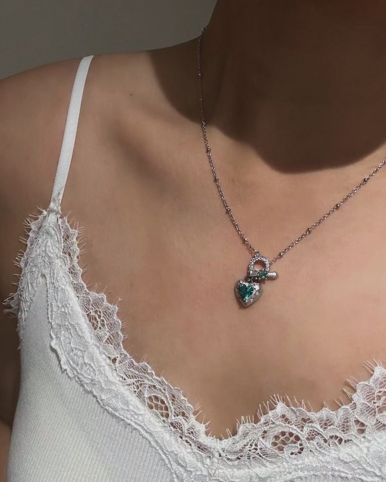 Emerald Lock Heart necklace, silver stainless steel heart-lock pendant with emerald-green stone