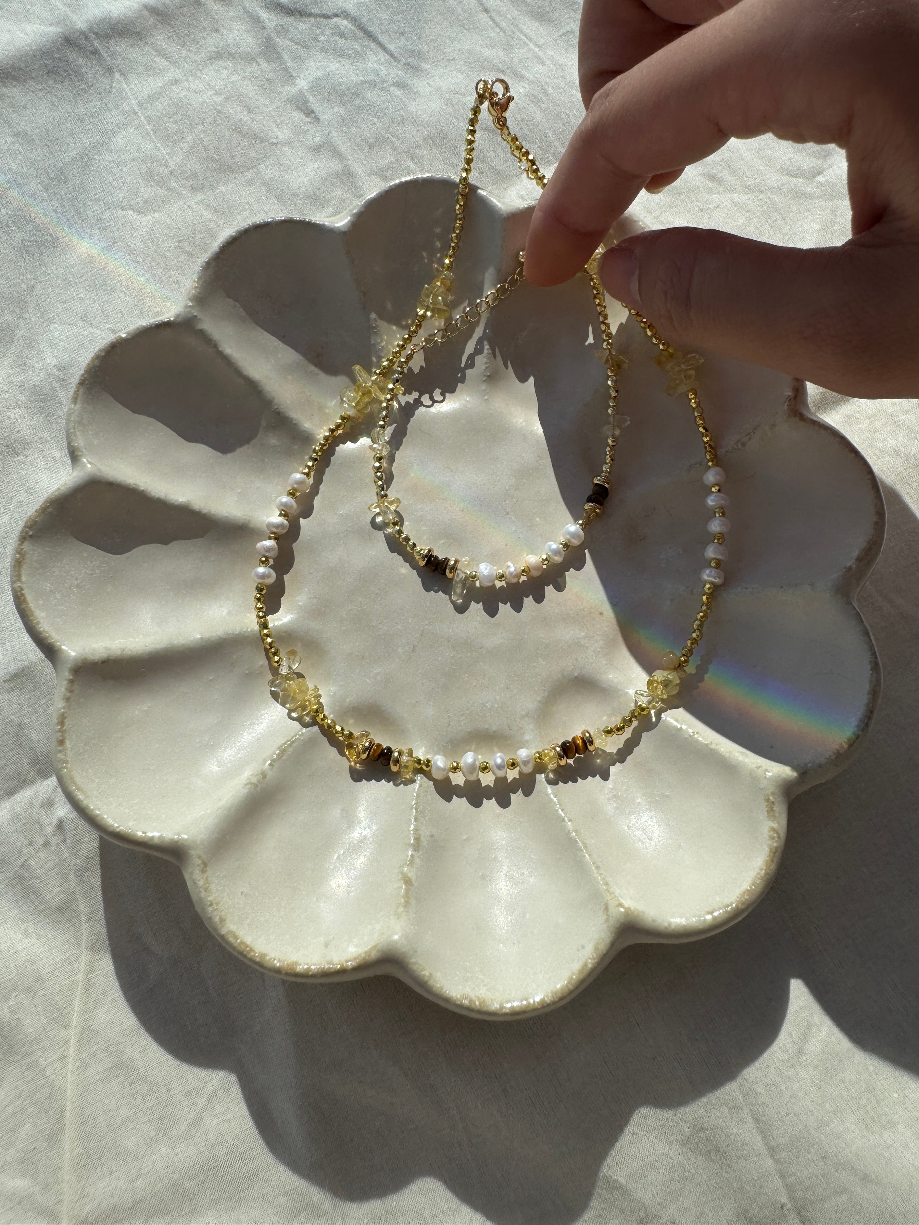 Champagne Pebble crystal necklace and bracelet set with pebble-cut beads, 18K gold plated accents, adjustable